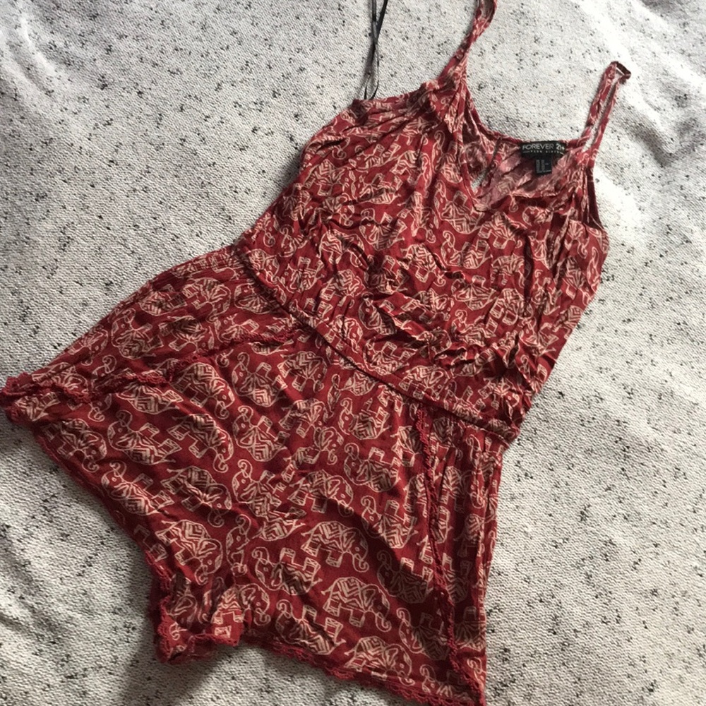 Burnt orange elephant print romper